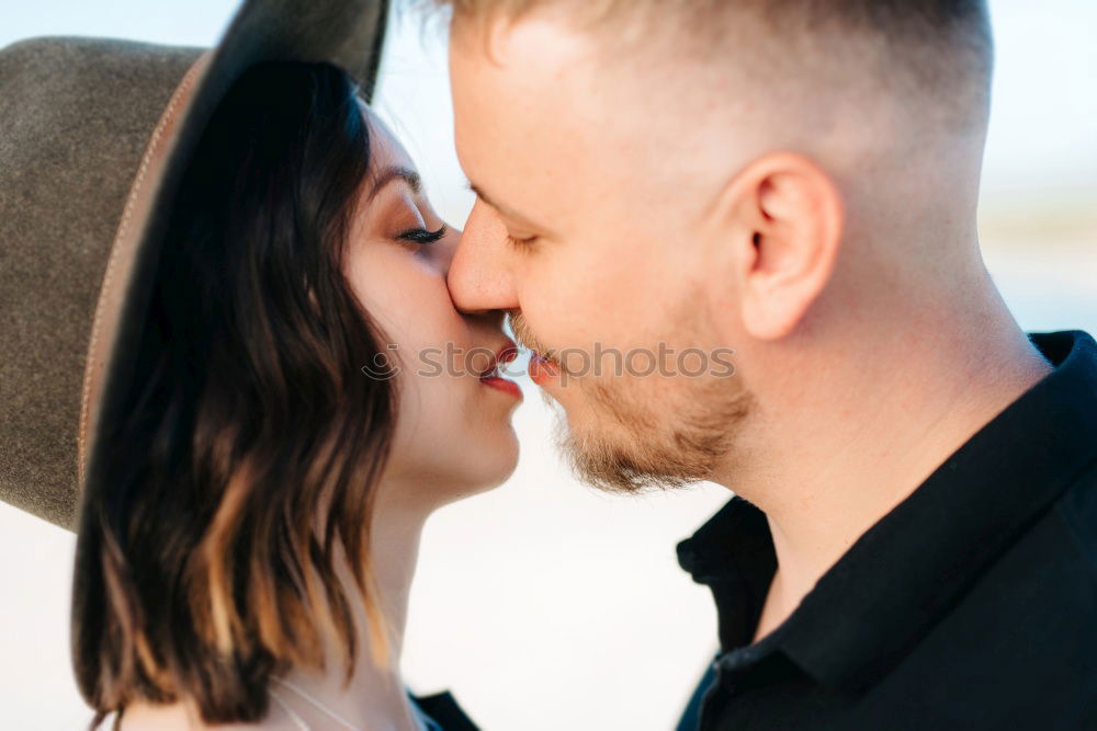 Similar – Image, Stock Photo Happy couple hugging and kissing near tree in park