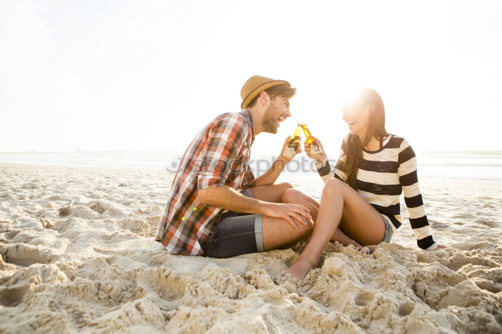 Similar – Father and daughter with balloons playing on the beach