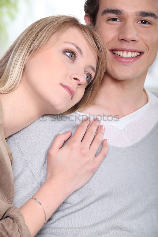 Similar – Young beautiful couple posing wearing jeans and t-shirt