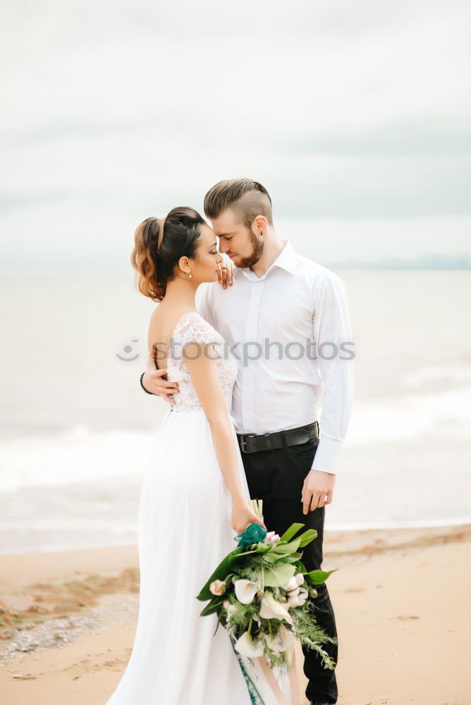 Similar – Image, Stock Photo Crop bride with bouquet embracing groom