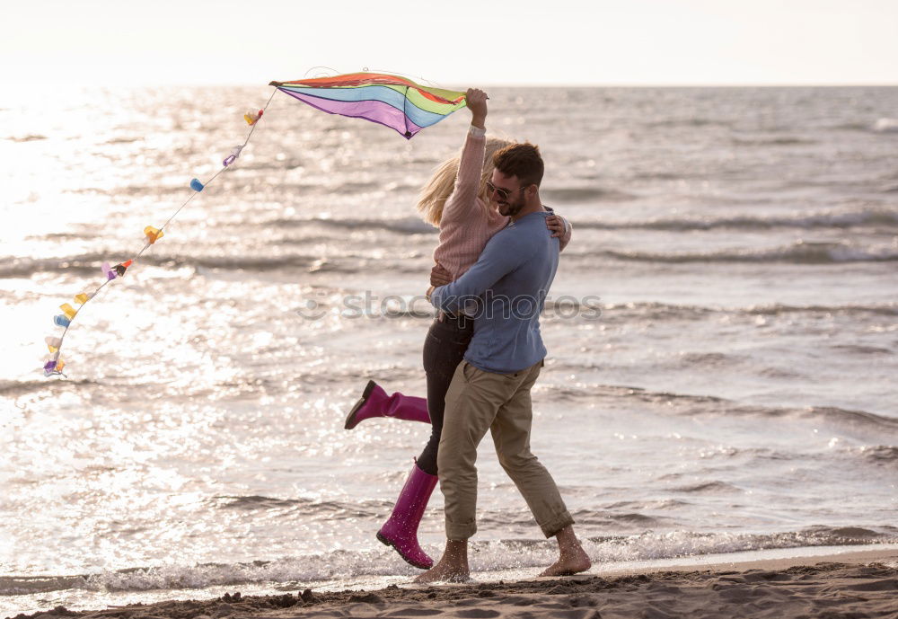 Similar – Father and son playing on the beach at the day time.