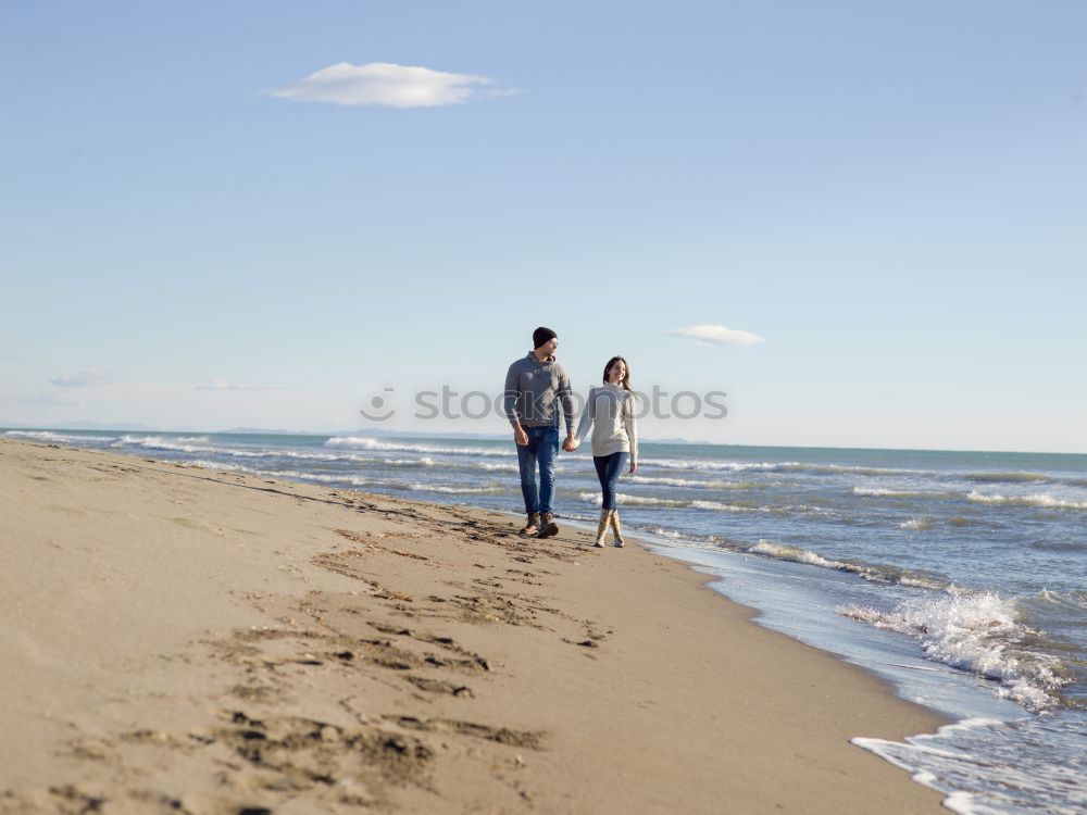 Similar – Image, Stock Photo Romantic bride and groom strolling on beach