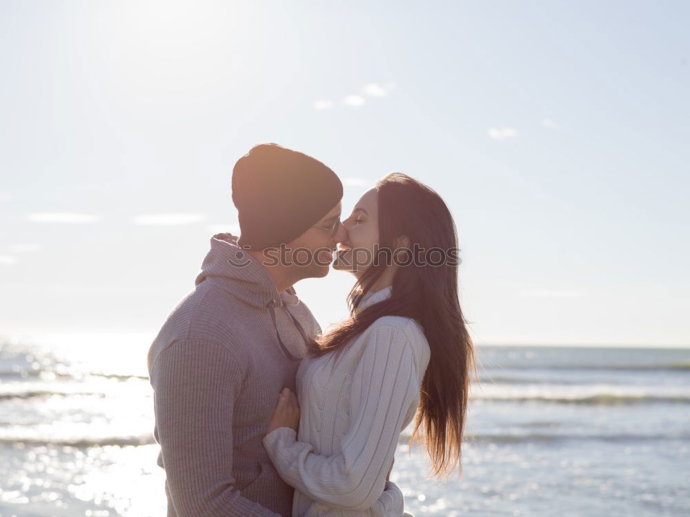 Similar – Unrecognizable couple walking embracing together