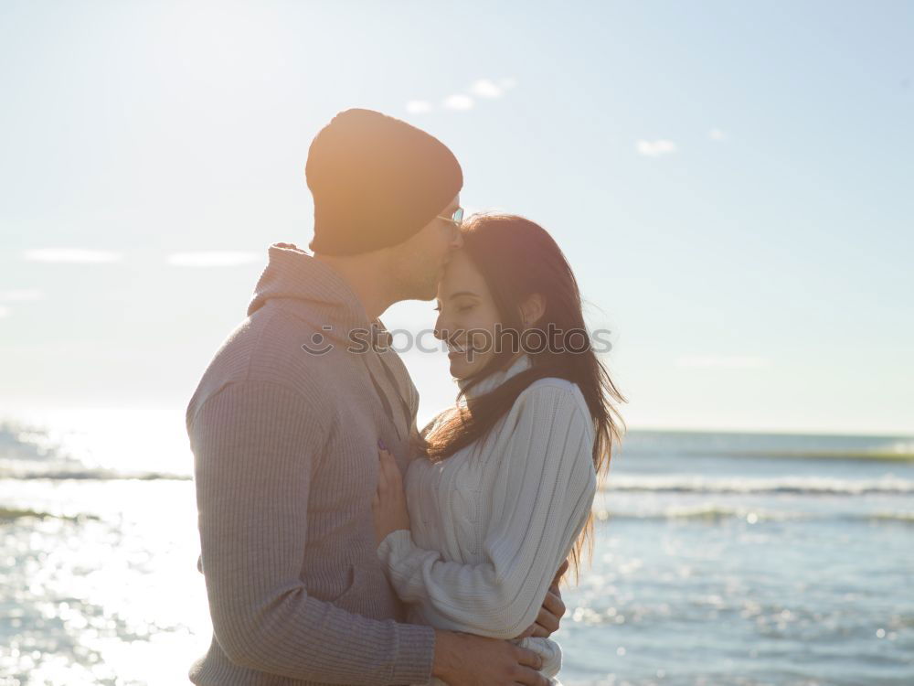 Image, Stock Photo Tender kissing bridal couple in sunlight