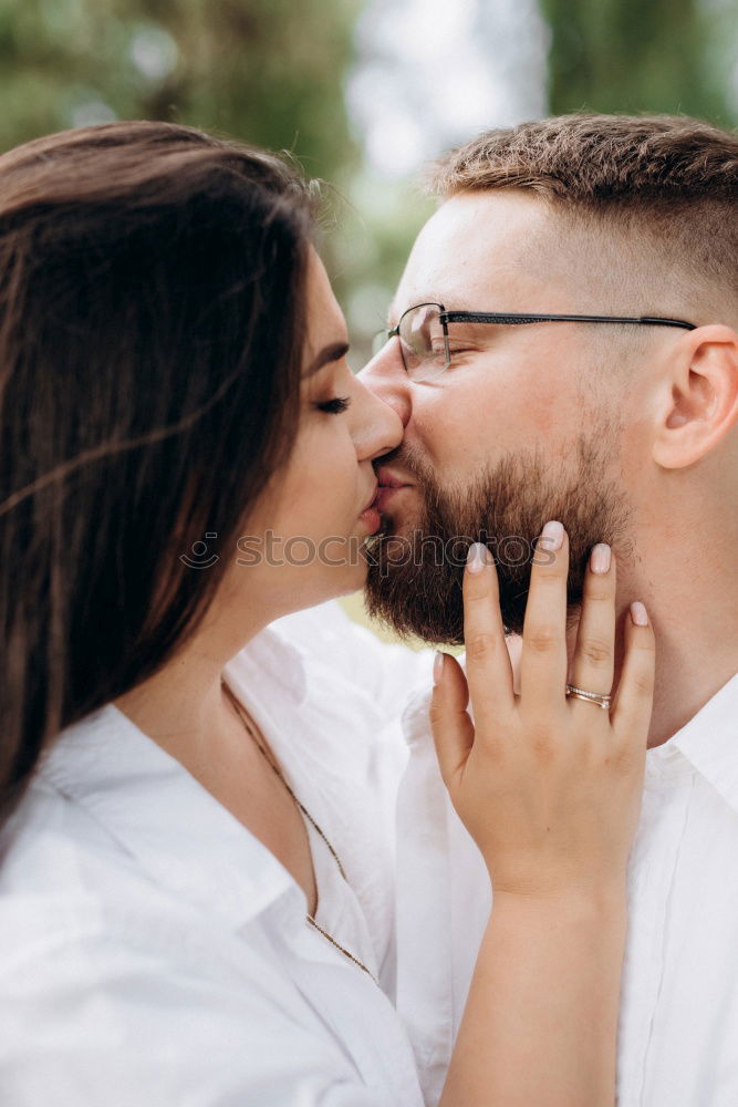 Similar – Image, Stock Photo Couple embracing on evening street