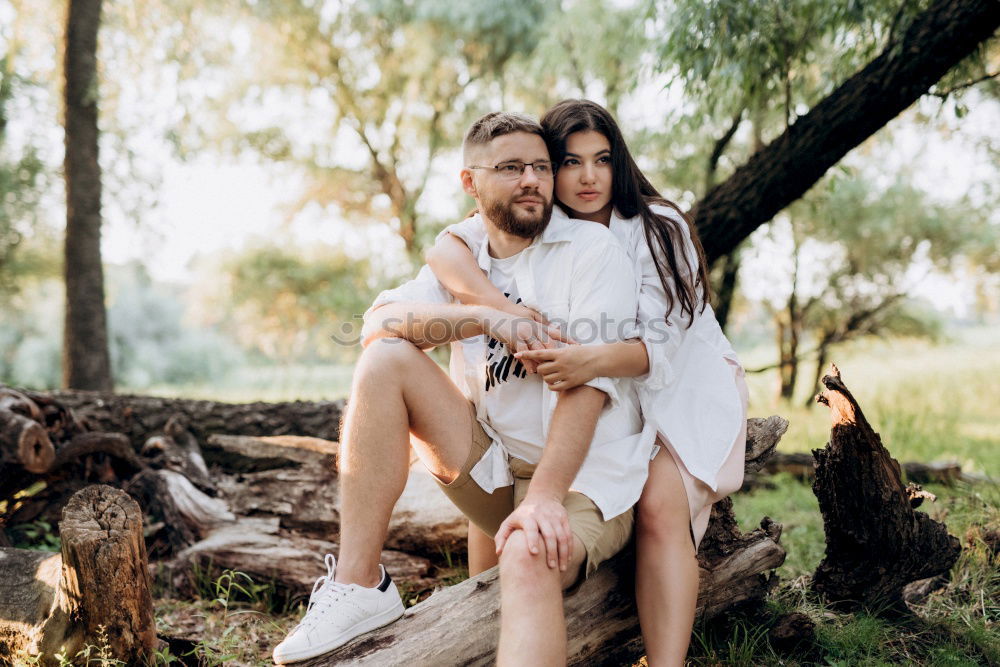 Similar – Image, Stock Photo Happy couple hugging and kissing near tree in park