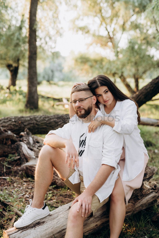 Similar – Image, Stock Photo Happy couple hugging and kissing near tree in park