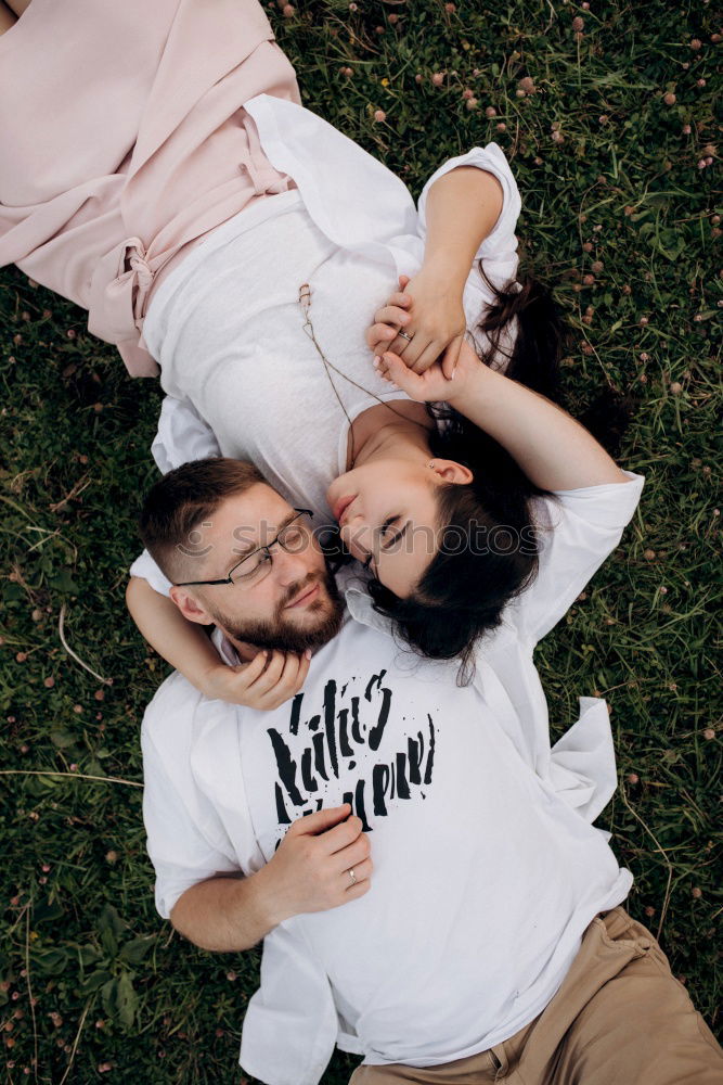 Similar – Image, Stock Photo Happy couple hugging and kissing near tree in park