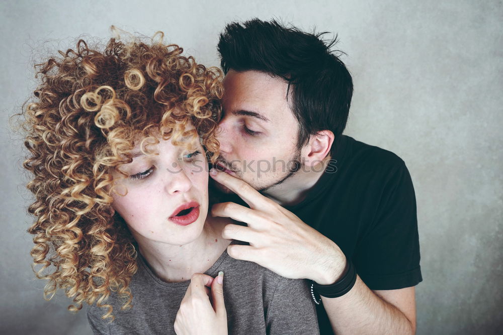 Similar – Portrait of couple of young people arguing