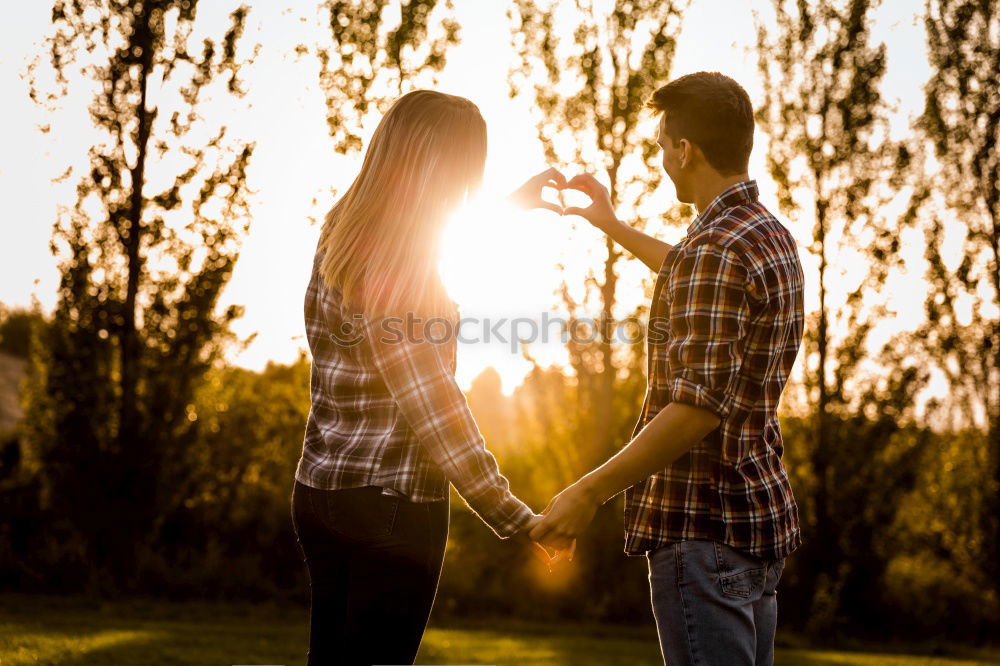 Similar – Happy couple hugging each other