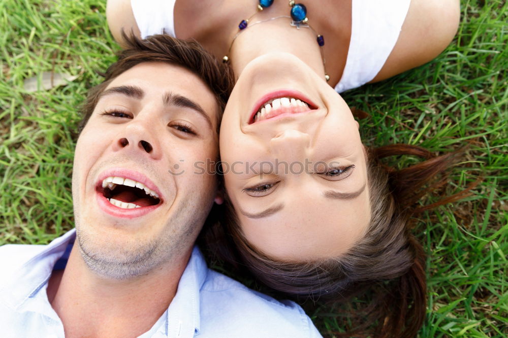 Similar – Image, Stock Photo a couple of teenagers lying in the grass