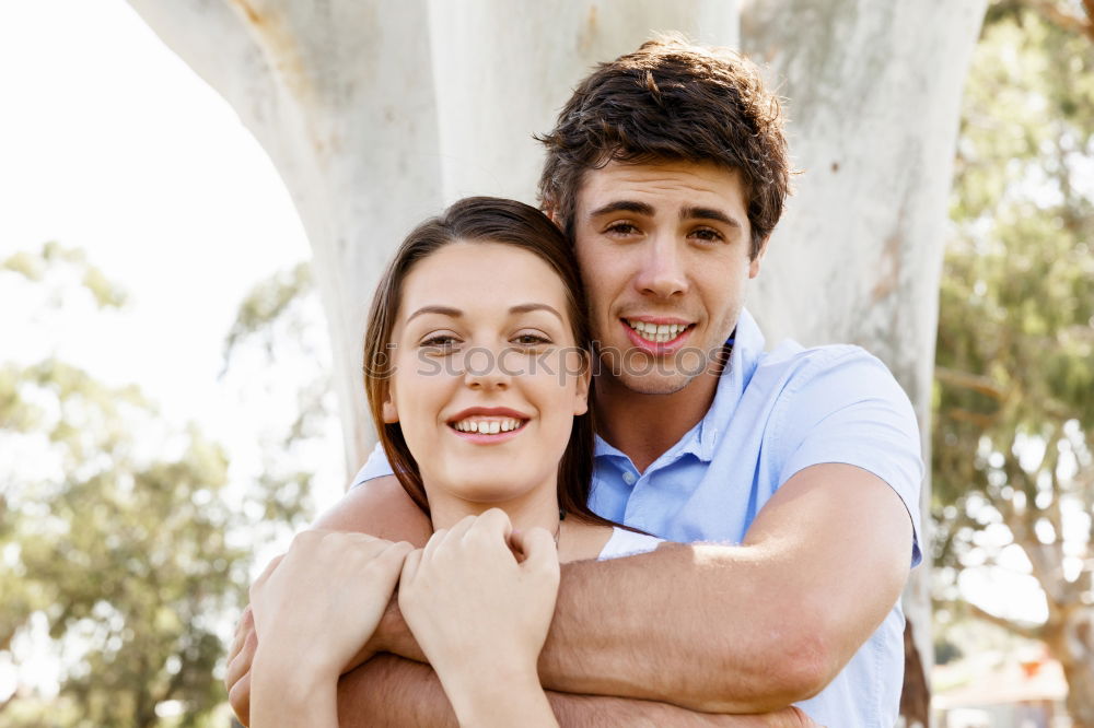 Similar – Image, Stock Photo Beautiful young couple laying on grass in an urban park