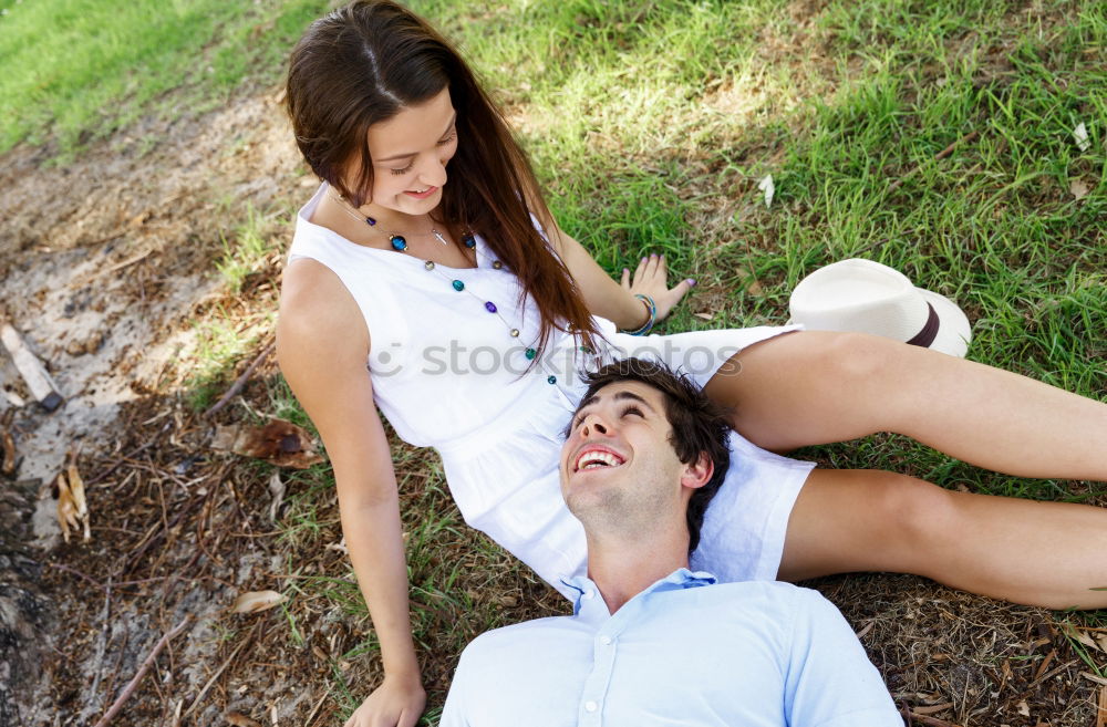 Similar – Cheerful couple having fun