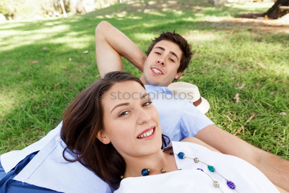 Similar – Image, Stock Photo a couple of teenagers lying in the grass