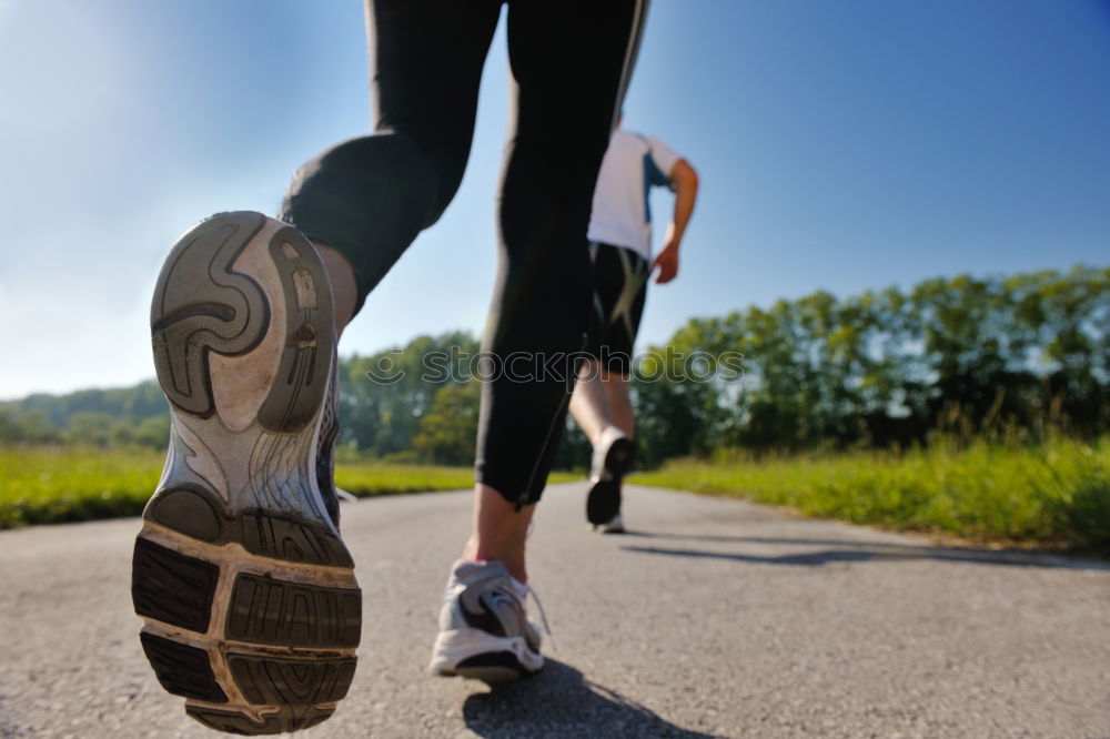 Similar – Image, Stock Photo Close up of legs of runner in the city.