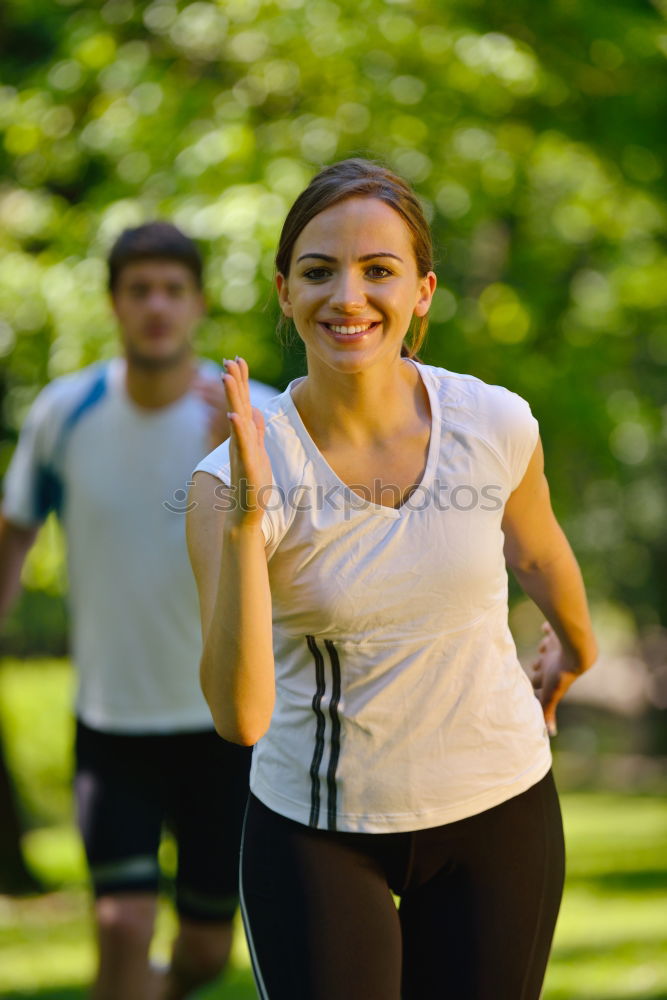 Similar – Athletic Woman in Running Exercise at the Park