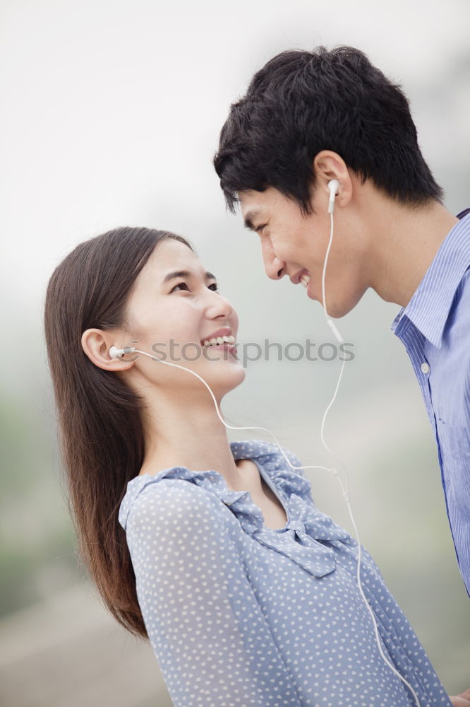 Similar – Young beautiful couple posing wearing jeans and t-shirt