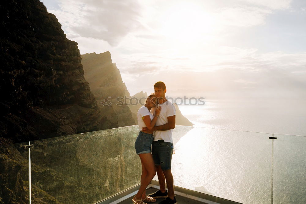 Similar – Image, Stock Photo A couple kissing in “the best bench in the world”