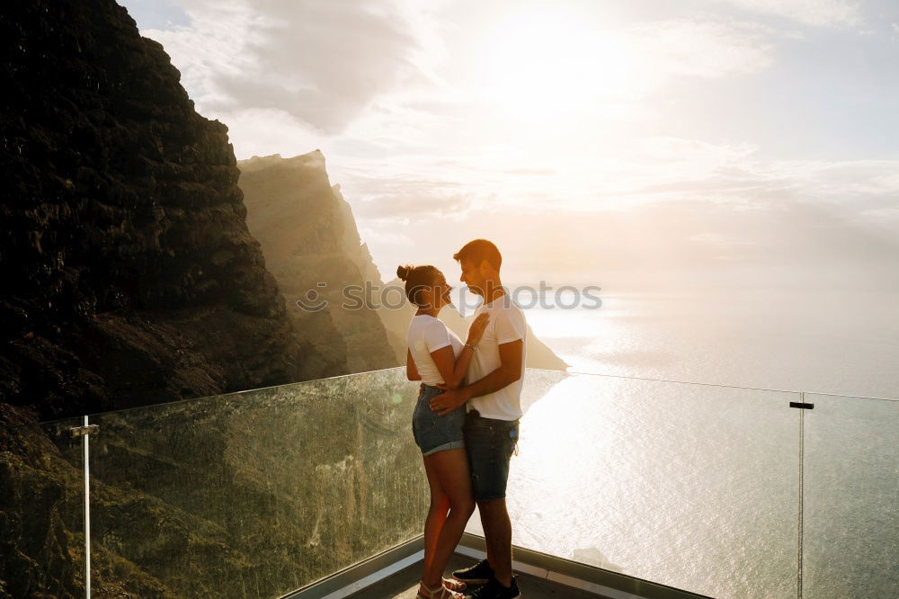 Similar – Image, Stock Photo A couple kissing in “the best bench in the world”