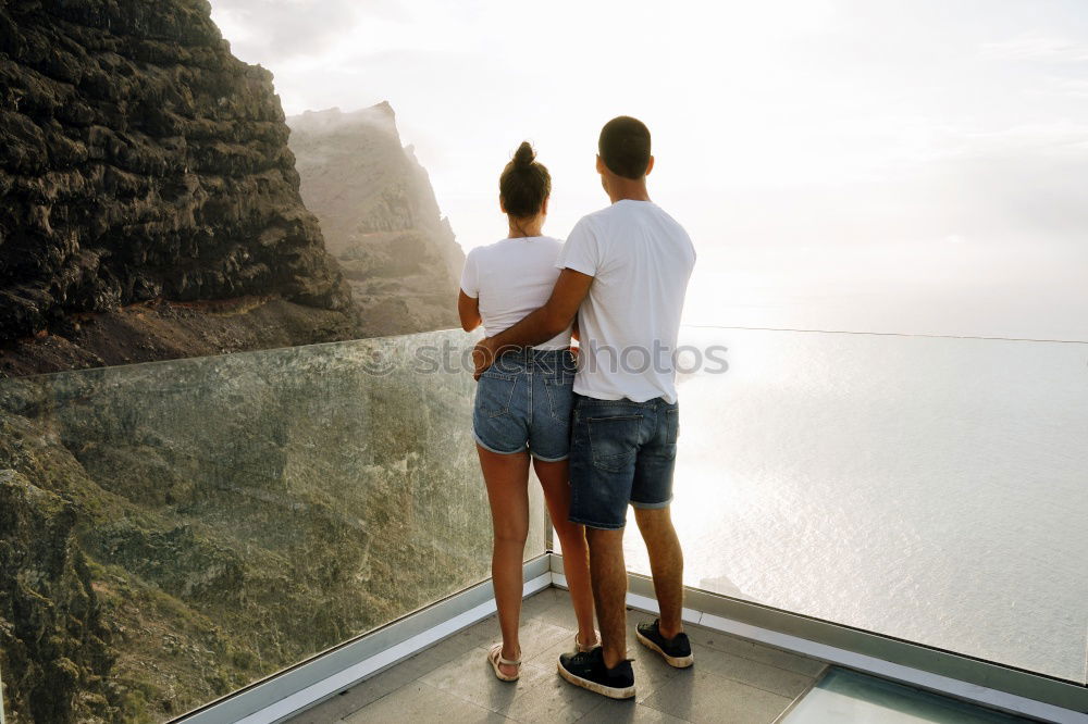 Similar – Image, Stock Photo A couple kissing in “the best bench in the world”