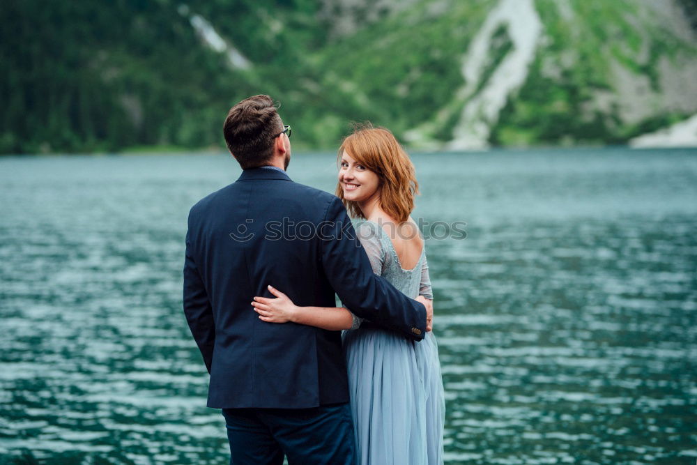 Similar – Two happy lovers on Holiday in the alps mountains