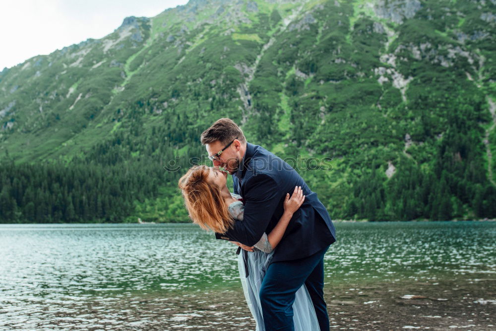 Similar – Two happy lovers on Holiday in the alps mountains