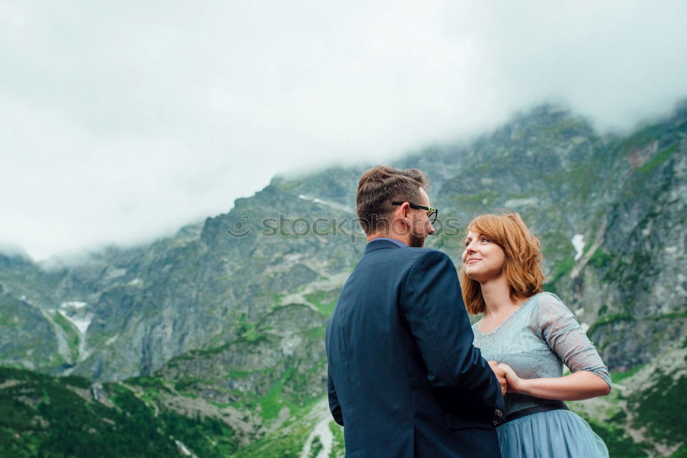 Similar – Two happy lovers on Holiday in the alps mountains