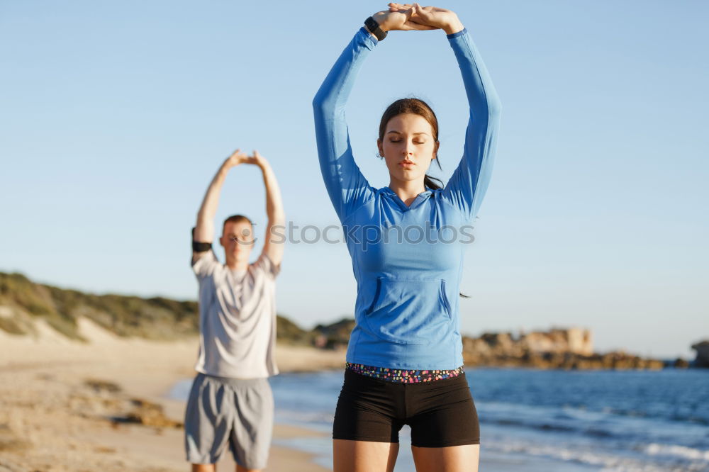 Similar – Image, Stock Photo Mother and daughter doing yoga exercises on the beach.