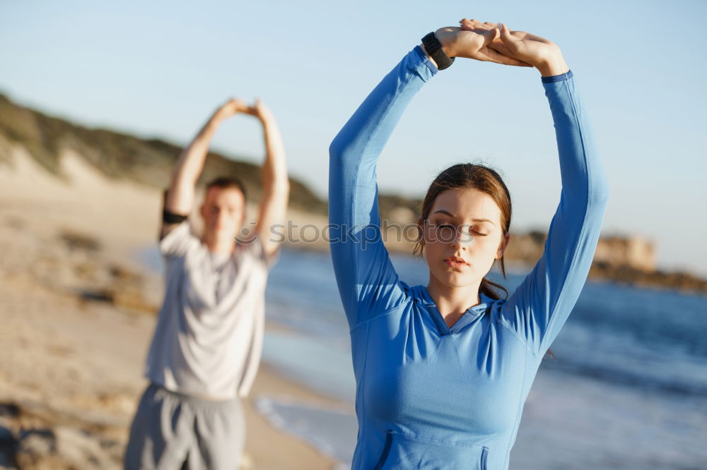 Similar – Image, Stock Photo Mother and daughter doing yoga exercises on the beach.