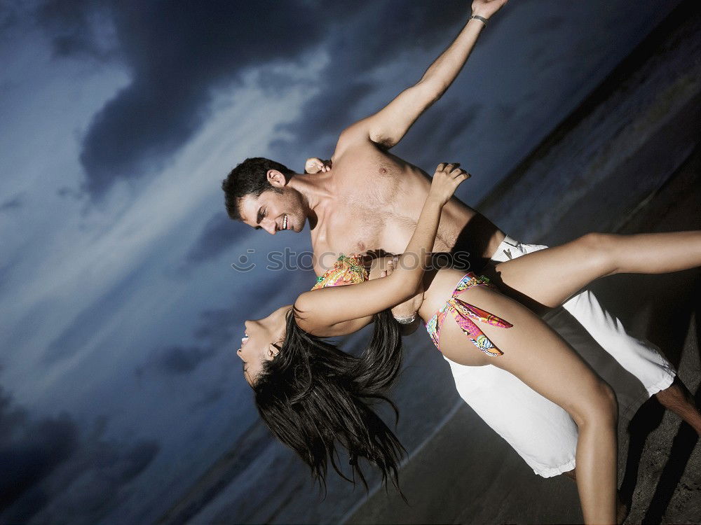 Similar – Image, Stock Photo Two adults training on the beach together