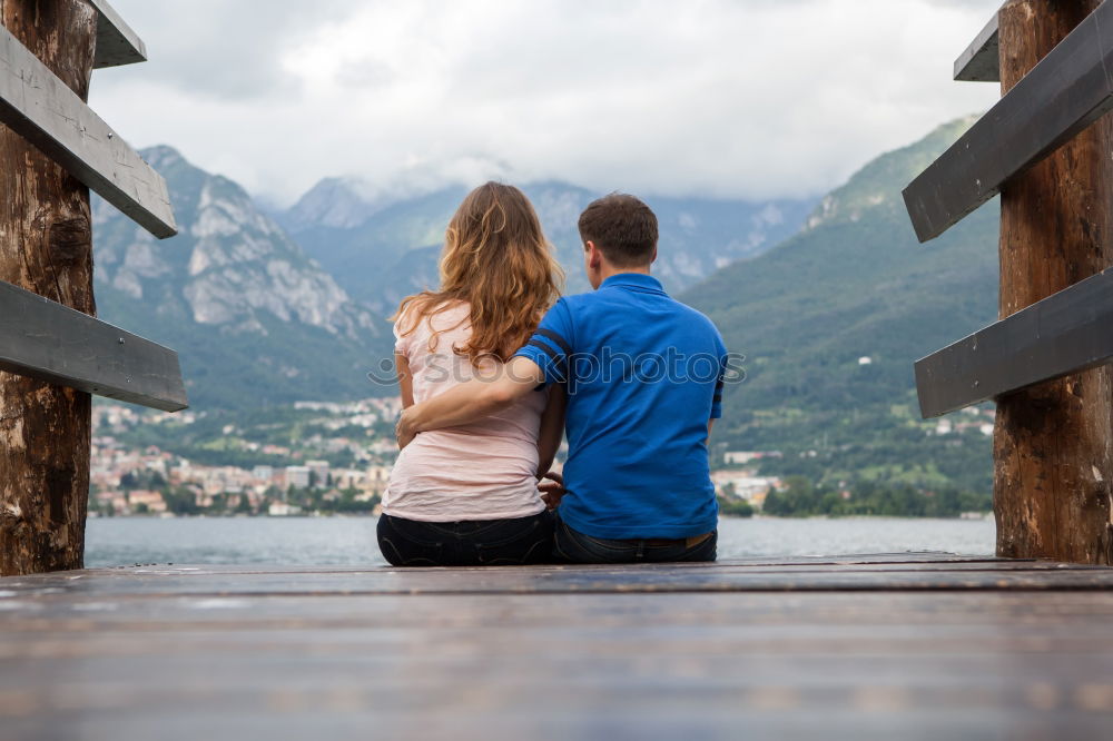 Similar – Image, Stock Photo Couple embracing on pier