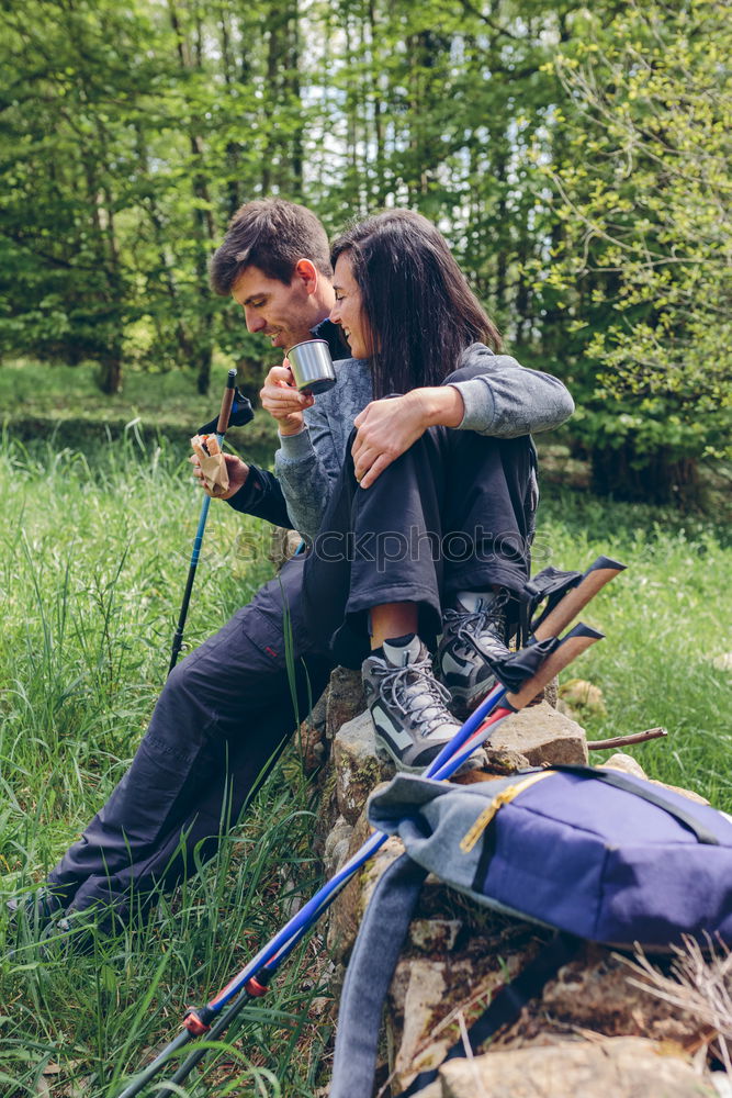 Image, Stock Photo Couple pausing while doing trekking