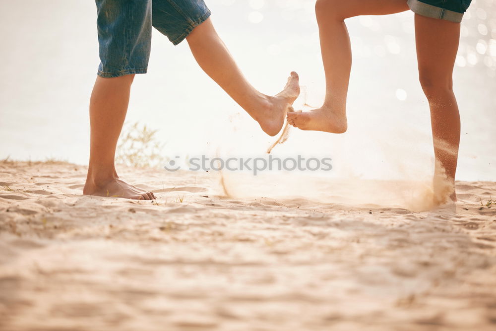 Similar – Closeup of couple holding hands