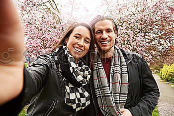 Similar – Image, Stock Photo Happy couple talking sitting near River Thames