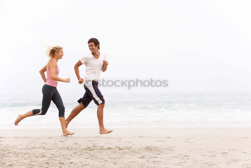 Image, Stock Photo Two sportsmen running on beach