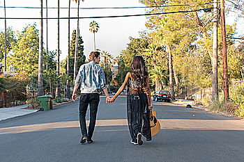 Image, Stock Photo Young couple walking through the city