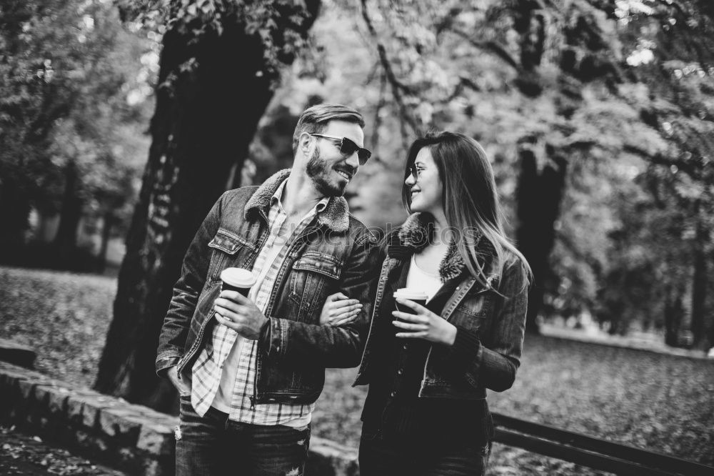 Similar – Image, Stock Photo Alternative couple black and white outdoors portrait.