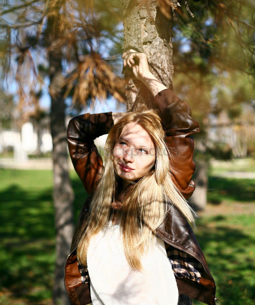 Similar – Young woman in the park