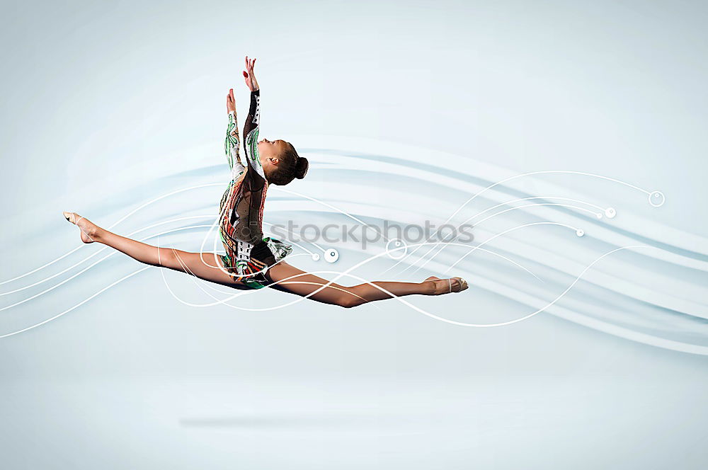 Similar – Image, Stock Photo Young rhythmic gymnast doing split jump during ribbon exercises.