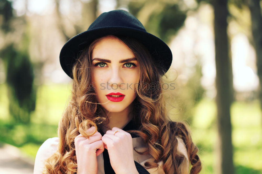 Similar – Beautiful young girl wearing beret standing in the street.