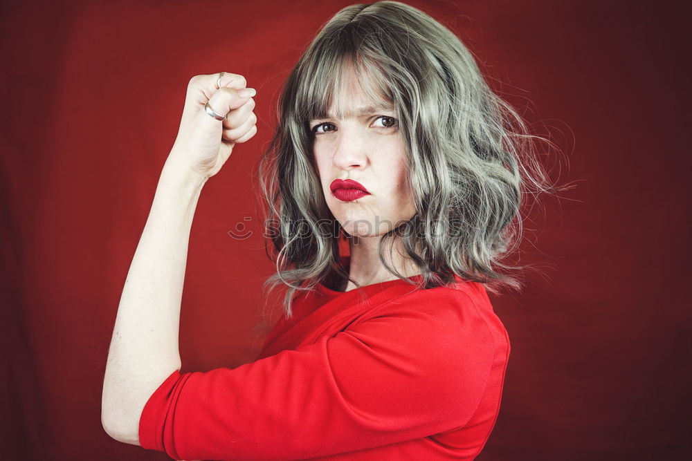 Image, Stock Photo Young expressive woman in a classic feminist image