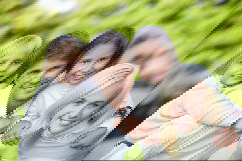 Similar – Image, Stock Photo Happy young family in a urban park.