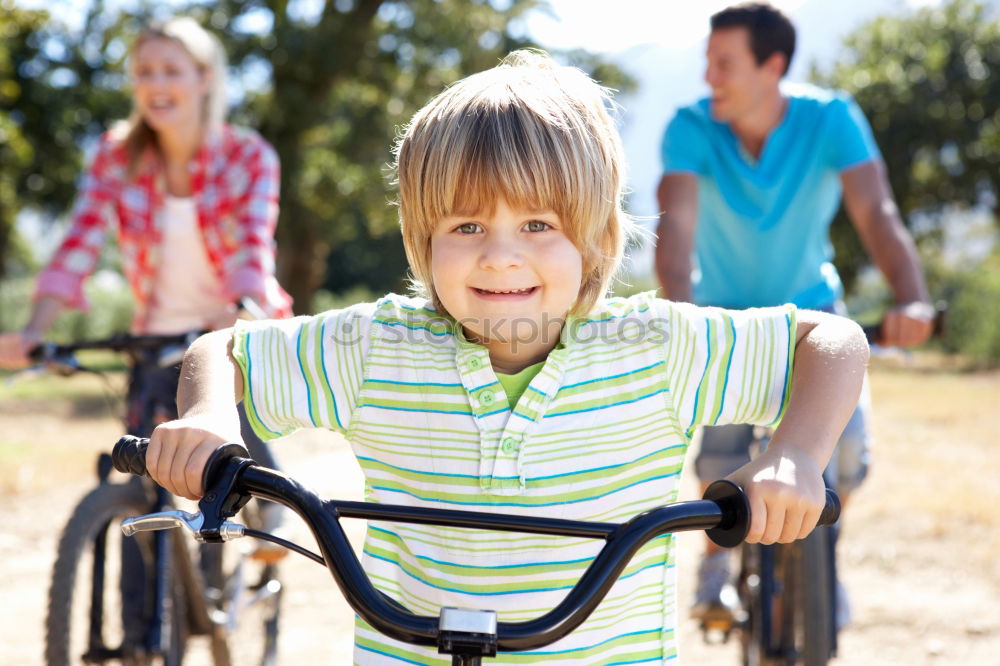 Similar – Image, Stock Photo happy child on a bicycle