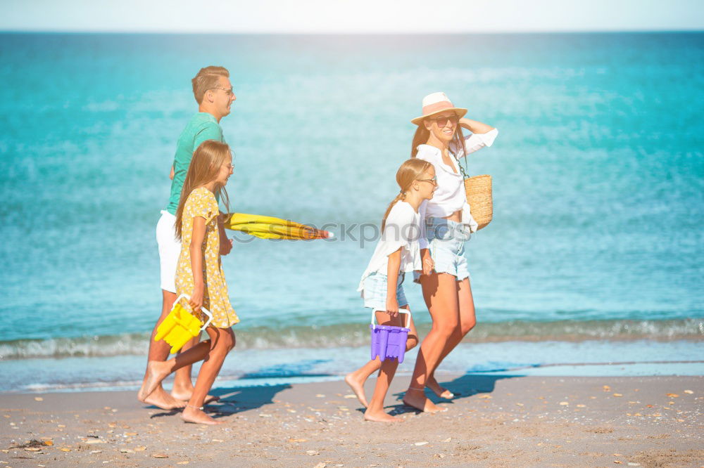 Similar – Image, Stock Photo Mother and children playing on the beach.
