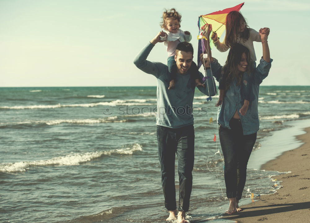 Similar – Image, Stock Photo Father and son playing on the beach at the day time. They are dressed in sailor’s vests and pirate costumes. Concept of happy game on vacation and friendly family.