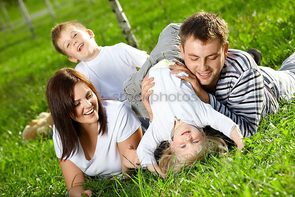 Similar – Happy family in a urban park playing with tablet computer