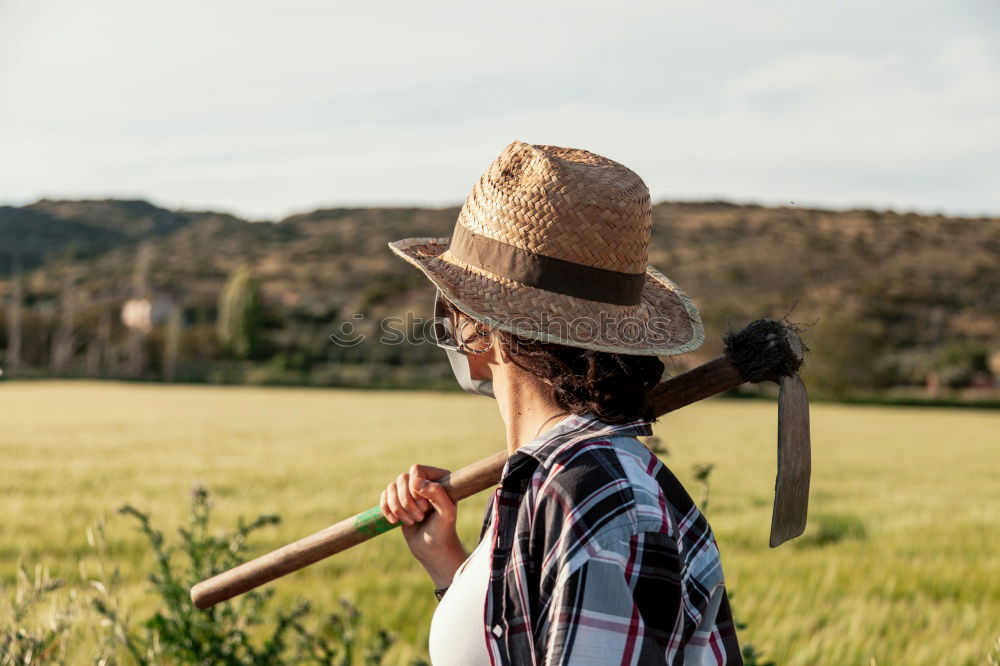 Similar – Young black woman eating a grape in a vineyard