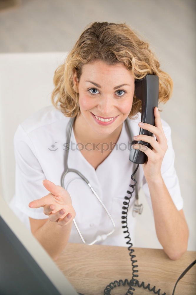 Similar – Image, Stock Photo Caregiver checking blood pressure to a senior woman