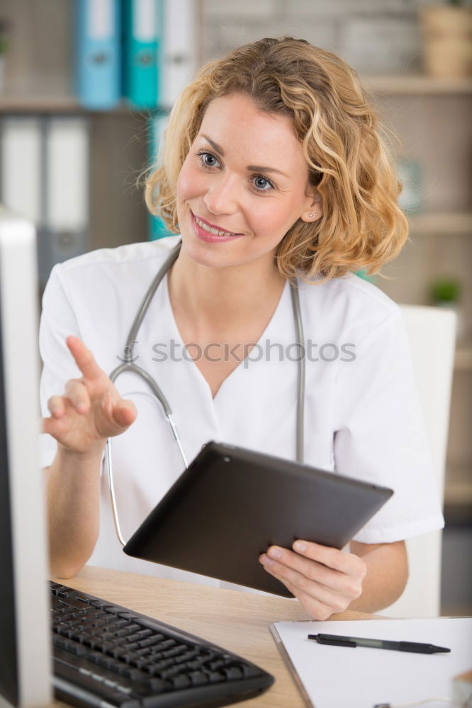 Image, Stock Photo Caregiver checking blood pressure to a senior woman