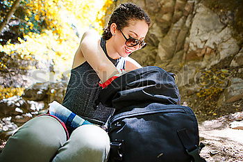 Image, Stock Photo Young climbers putting climbing shoes on